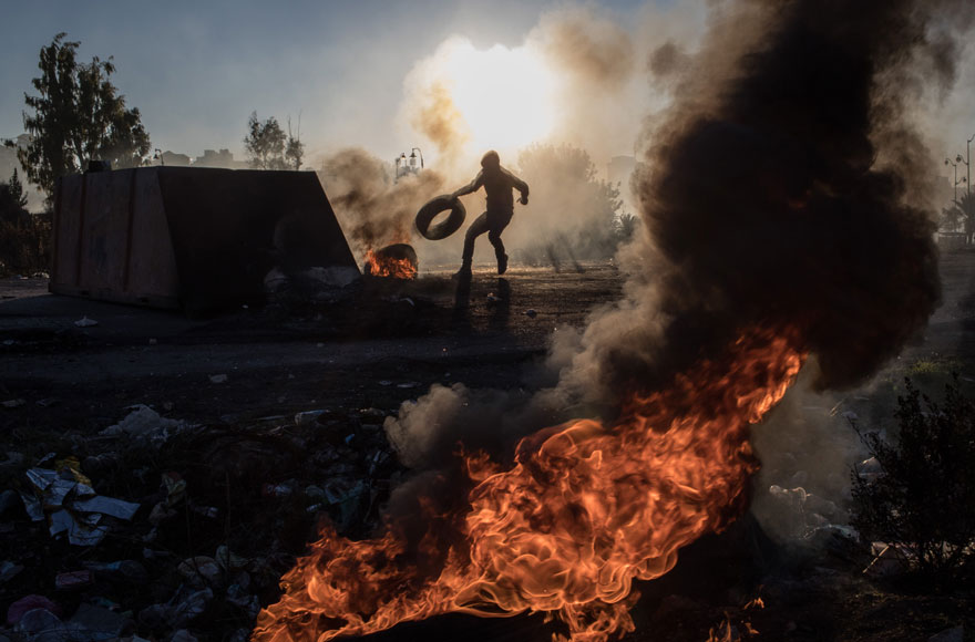 Settlement shooting triggers a wave of violence in the West Bank